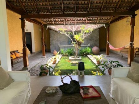 Living Room - Colonial style house in a serene surrounding.